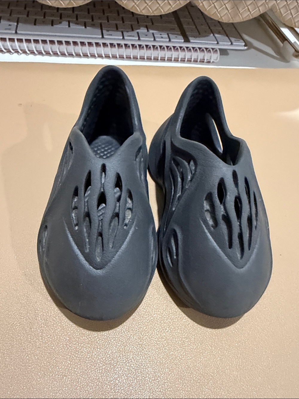 Yeezy Kids Foam Slip-On Sandals in Charcoal Black